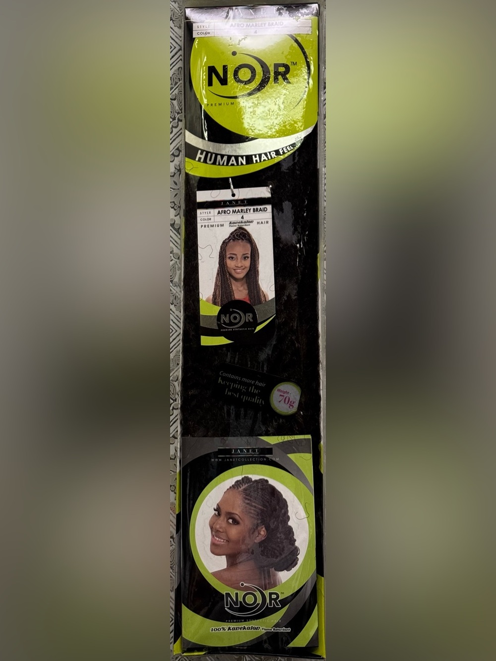 Janet collection. Noir premium synthetic hair. Afro Marley braid.